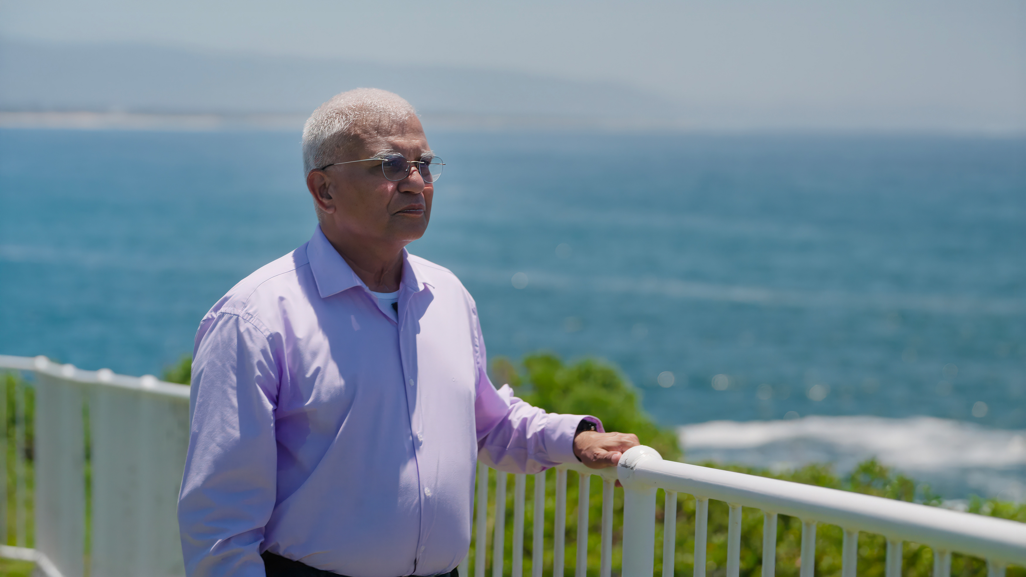 Sudarshan Shrikhande looking at to sea contemplating 