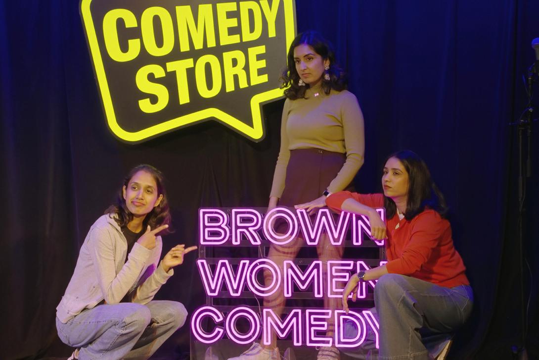 Brown Women Comedy on stage together
