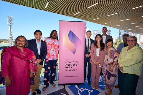 Attendees of the WACA event stand for photograph