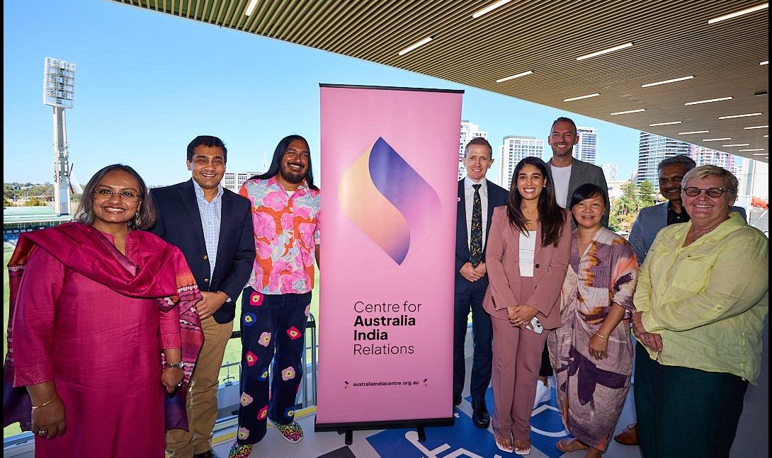 Attendees of the WACA event stand for photograph